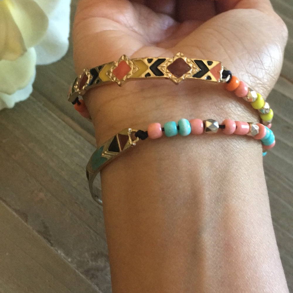 2 colorful draw string bracelets.